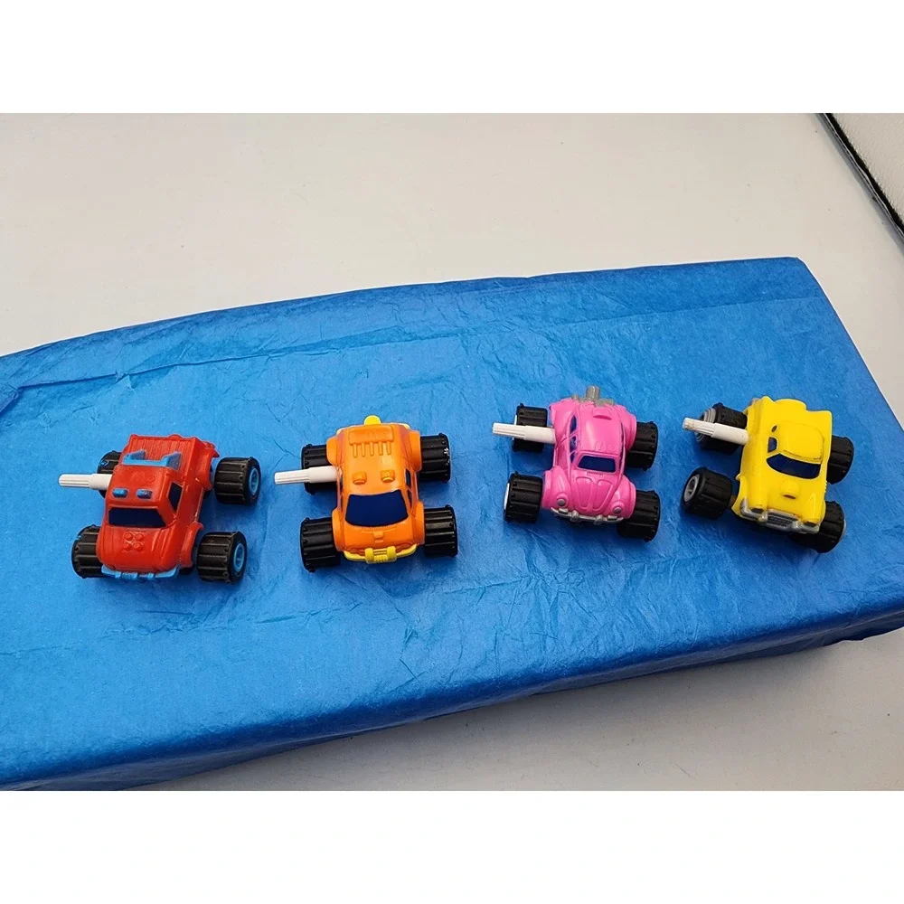 Vintage Style Wind Up Monster Truck Toy Car Lot Red Orange Pink Yellow Set of 4